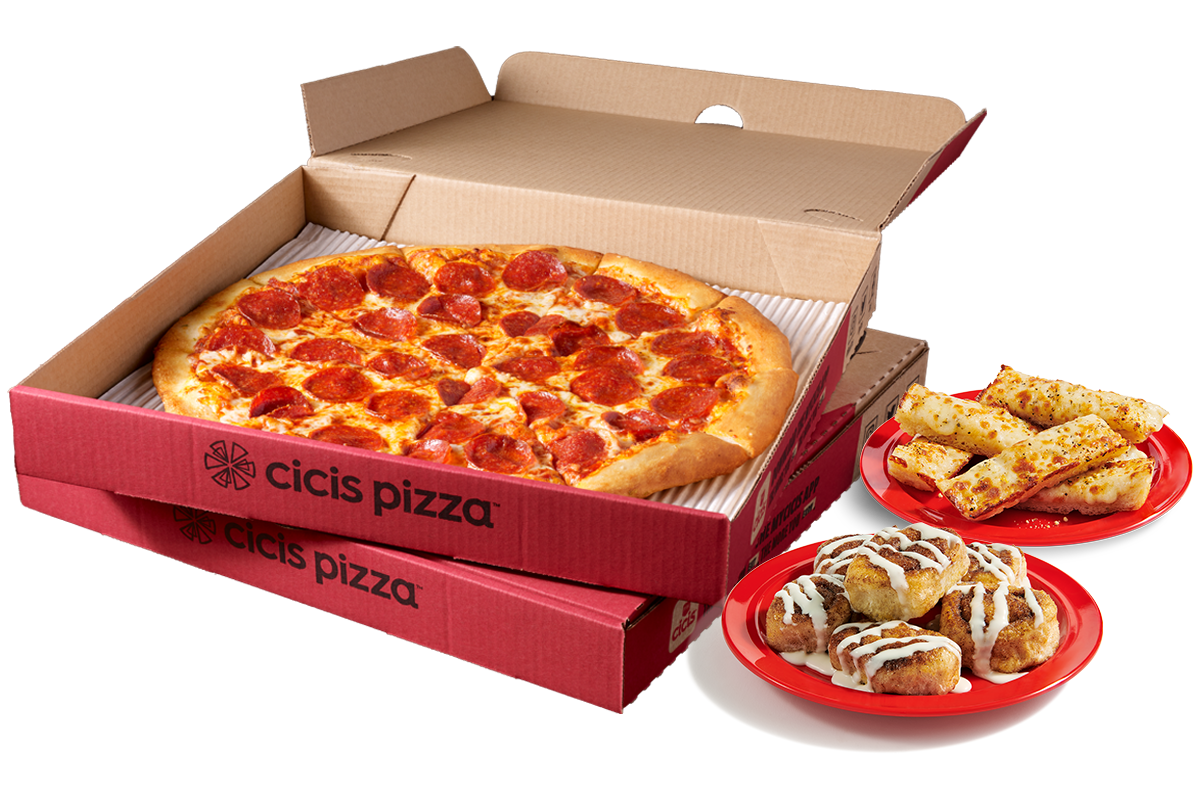 Stacked Cicis pizza boxes with one open showing a pepperoni pizza. Next to the boxes are a plate of cinnamon rolls and a plate of garlic cheesy bread.
